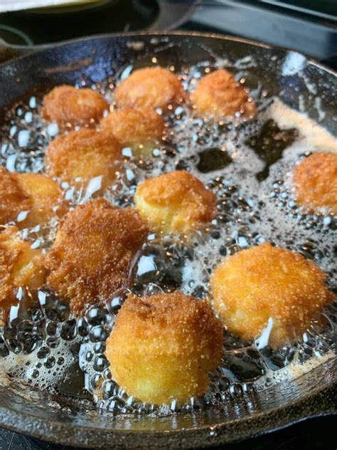 Homemade hush puppy recipe that goes well with fried cat fish and southern seafood dishes. Jiffy Cornbread Hush Puppies - Back To My Southern Roots