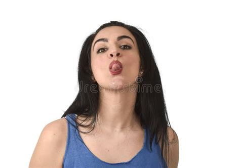 Attractive And Playful Woman Sticking Out Tongue In Funny Fresh Face