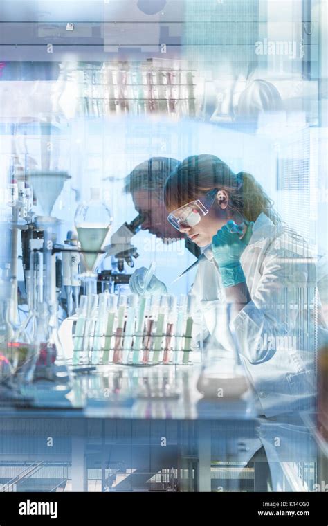 Health Care Researchers Working In Scientific Laboratory Stock Photo
