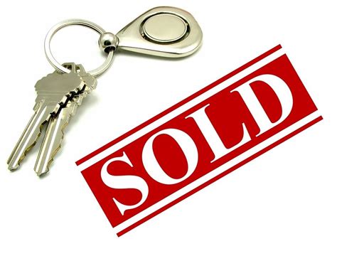 Maybe you would like to learn more about one of these? Sold sign and two keys on a key ring. Real estate sale and ...