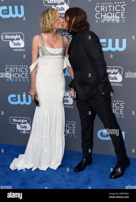 Diane Kruger Left Kisses Norman Reedus As They Arrive At The 23rd Annual Critics Choice