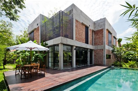 Mm Architects Wraps Vietnamese Villa With Pivoting Doors