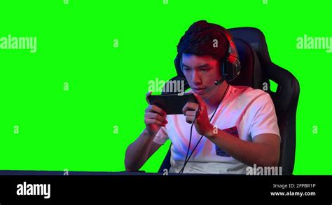 Pro Cybersport Gamer Play Online Mobile Game Over Green Screen