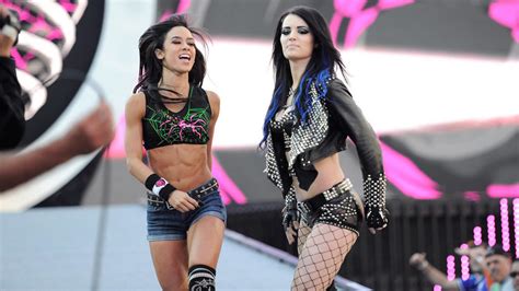 Aj Lee And Paige Vs The Bella Twins Photos Wwe