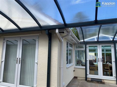 Buy a 3 car carport Double Curved Carport & Patio Canopy installed in Bridgwater | Kappion Carports & Canopies