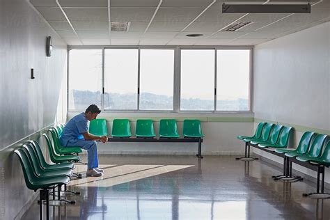 Doctor Resting Alone In A Hospital Waiting Room By Miquel