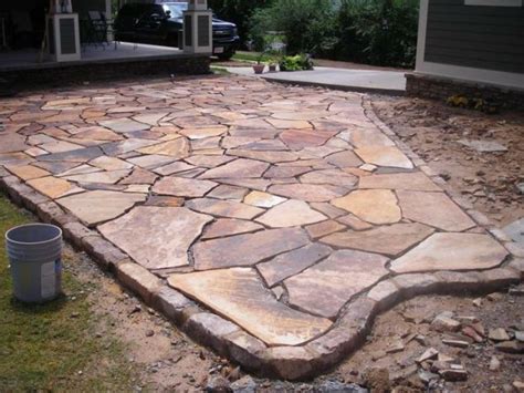 Once you've removed the topsoil, add a base layer of gravel and compact it. Solve the Puzzle: DIY Flagstone Walkway Tutorial For ...