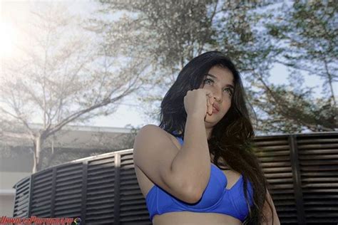 Indonesian Sexy Model Hot Photo Siva Aprilia Blue Bikini In The Pool Photoshoot