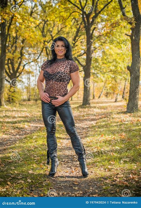 Athletic Lady At Nature Lifestyle Of Bodybuilder Woman Stock Photo