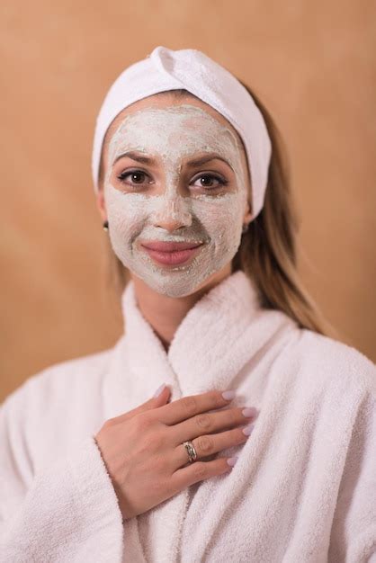Premium Photo Spa Woman Applying Facial Mask Beauty Treatments Close
