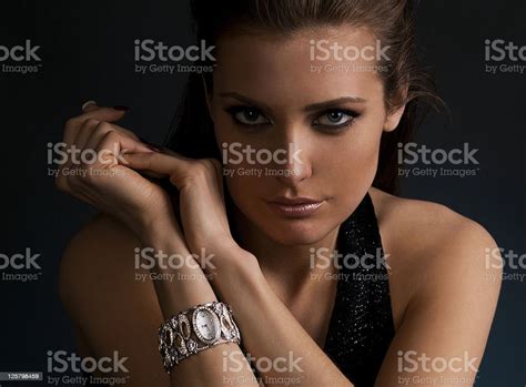 Luxury Young Darkhaired Girl In Exclusive Jewelry Wrist Watch Stock