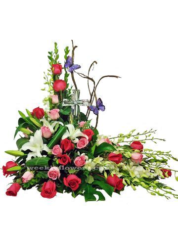 Any type of flower can be used in this process. Crystal Cross Arrangement | Funeral flower arrangements ...