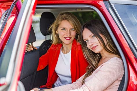 Girls In Back Seat Of Car Looking Out Open Door Stock Image Image Of Seat Holiday 178235435