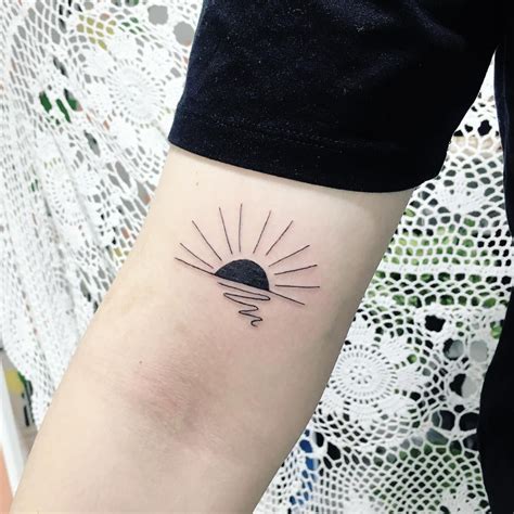 Minimalist Black Sunrise Tattoo On The Right Arm Sun Tattoo Designs
