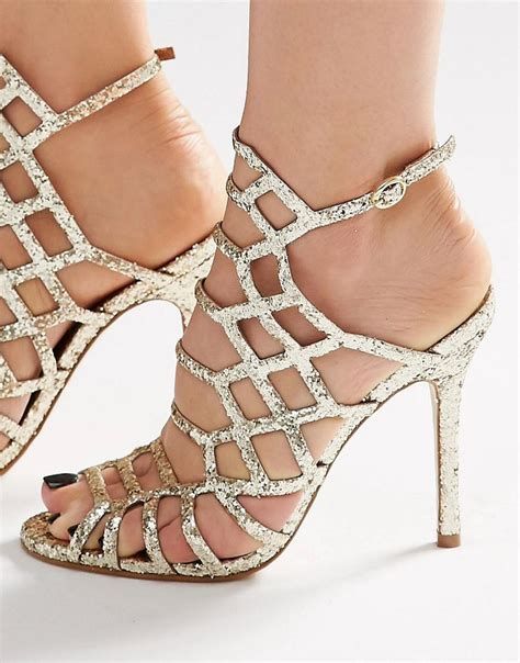 steve madden slithur gold glitter caged heeled sandals in metallic lyst