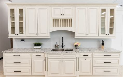 Casselberry Antique White Jgen Cabinets