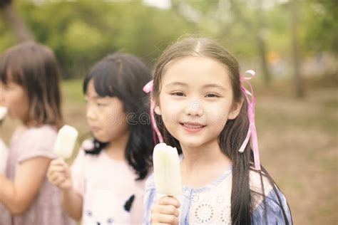 Children Eating Popsicle At Summertime Stock Image Image Of Little