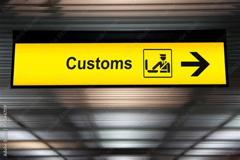 Foto De Airport Customs Declare Sign With Icon And Arrow Hanging From