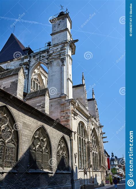 Stone Gargoyle And Turret Gothic Facade Of The Medieval Church In