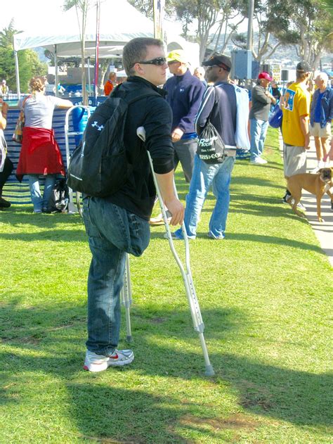 Amputee On Crutches