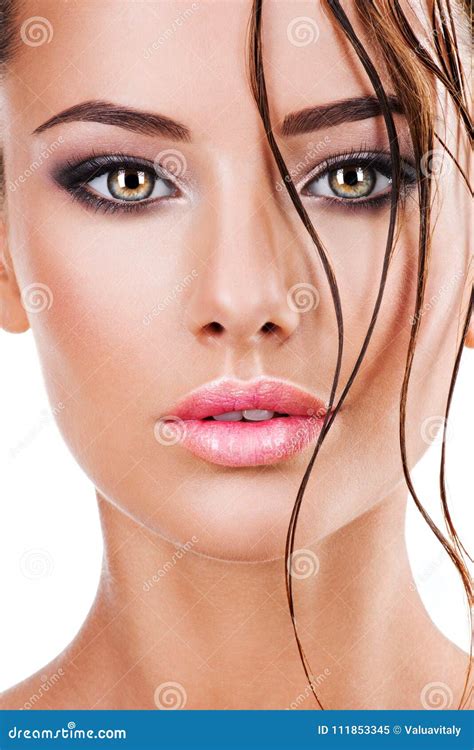 Beautiful Face Of A Woman With Dark Brown Eye Makeup Stock Image