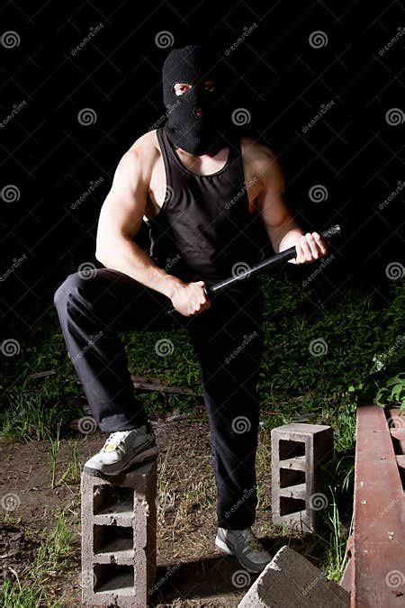 gangster with baton outdoors at night stock image image of brutal mafia 21679153