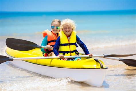 Kids Kayaking In Ocean Children In Kayak In Tropical Sea Stock Image