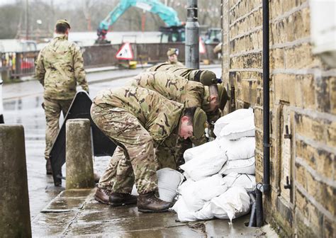 Army Personnel Help Build Flood Defences In Calder Valley As The Borough Prepares For Storm