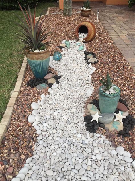 White Rocks Spilled From Jar 35 Stunning Front Yard Landscaping Ideas