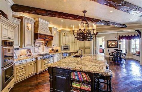 Rustic Kitchen With Raised Panel Cabinets Dark Wood Island And Gothic