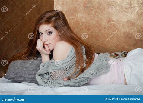 Attractive Red Hair Girl Lying On The Bed Stock Photo Image Of