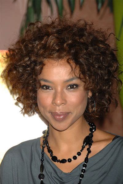It's practically a way of life! Sophie Okonedo // short curly hairstyle - unruly, but still long enough to pull top back a bit ...