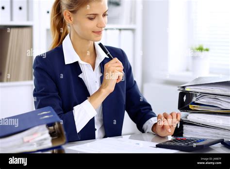 Modern Business Woman Or Confident Female Accountant In Office Stock