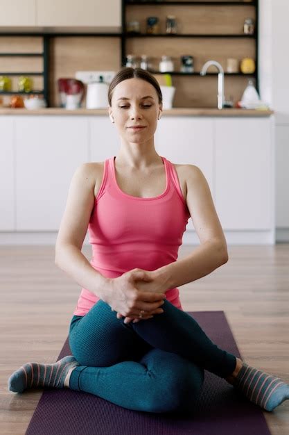 Free Photo Caucasian Woman Practicing Yoga At Home