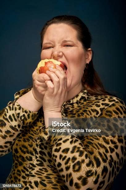 Hungry Fat Girl Eating A Red Apple Proper Nutrition Dark Blue