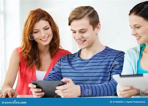 Smiling Students With Tablet Pc At School Stock Photo Image Of