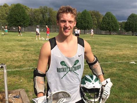 Scoring Standout For Reeths Puffer Lacrosse Draws On Hockey Background