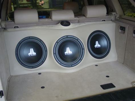 Bmw x5 with custom d2forged mb1 monoblock wheels. BMW X5 2005 custom subwoofer enclosure for three JL Audio ...