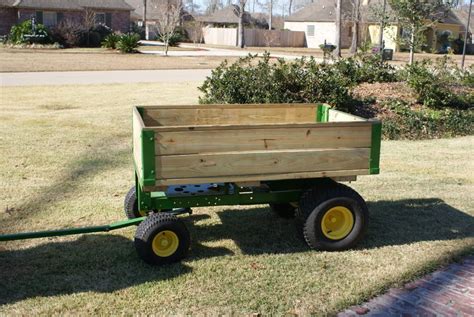 Homemade lawn tractor trailer constructed from tubing, flat bar stock, and wheels. Riding Mower Trailer Conversion | Lawn trailer, Lawn mower ...