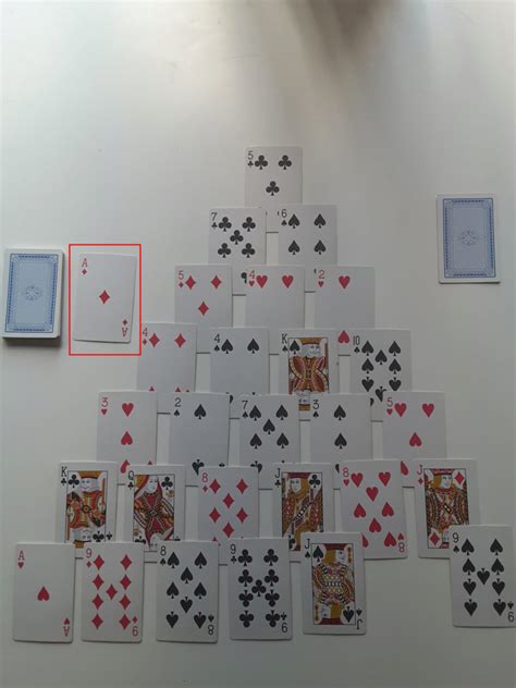 Play solitaire with playing cards. How to Play Pyramid Solitaire with Cards?