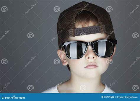 Little Boy Fashion Childrenhandsome In Sunglasses And Tracker Hat