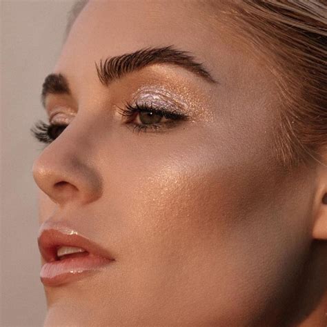 Close Up Of Woman With Beautiful Skin And Glowing Makeup Glowing