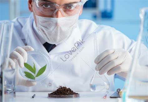 Photo Of A Male Scientist Researcher Conducting An Experiment In A