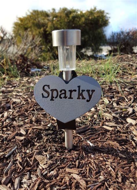 This is an excellent diy pet memorial to complete with children healing from the passing of a pet. Personalized Grave Marker Solar Light for Pet or Loved One - http://pets.goshoppins.com/pet ...