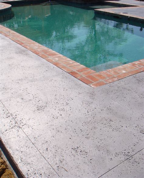 Stamped Concrete With Salt Rock Texture By Nu Crete Concrete Pool