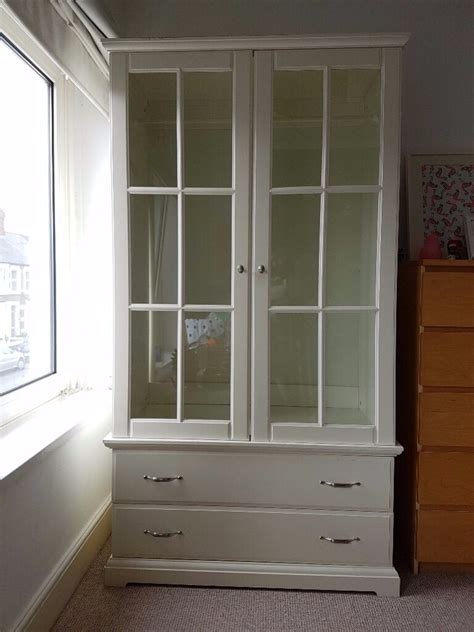 It will be in 3parts. Beautiful IKEA Birkeland White Glass Door Double Wardrobe ...