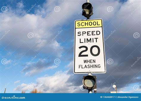Speed Limit 20 When Flashing Sign Near School Royalty Free Stock Photo