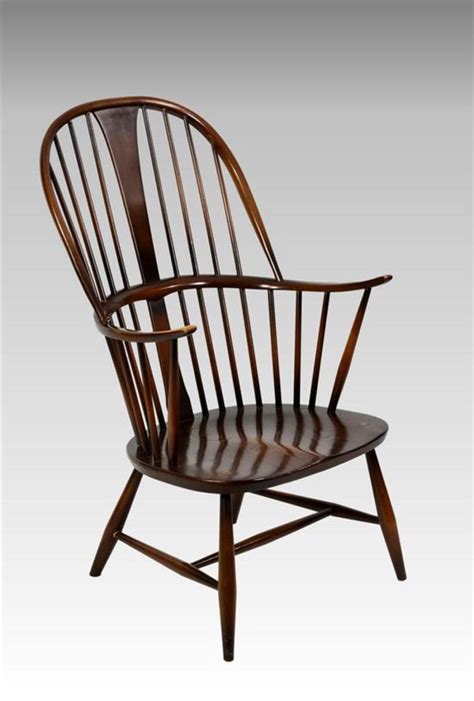 Lot An Ercol Comb Back Double Bow Chairmakers Windsor Armchair With