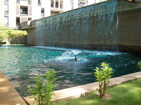 17 Lively Pool Waterfall Ideas That Will Blow You Away