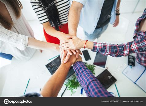 Business People Putting Hands Together — Stock Photo © Gladkov 175341770